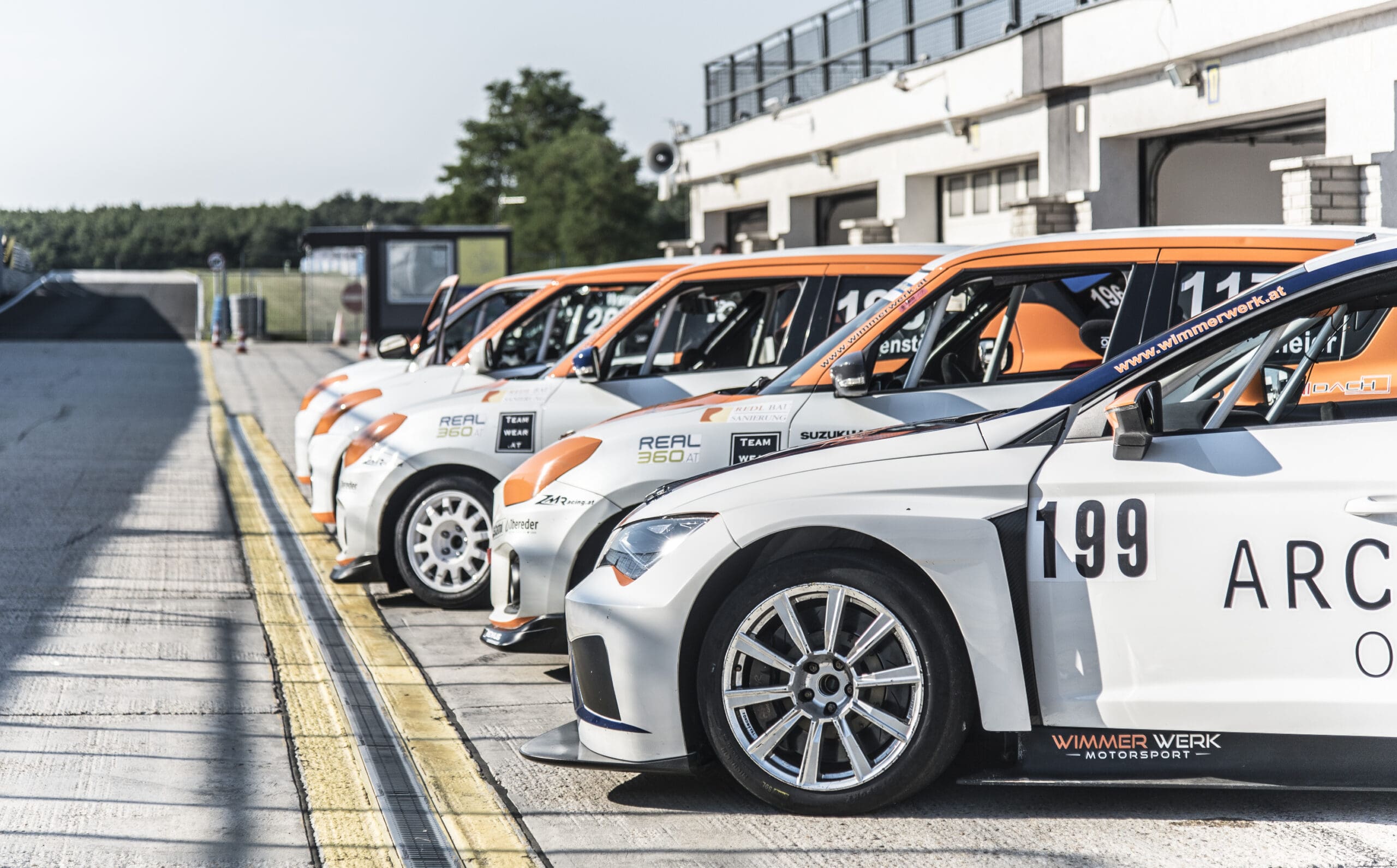 Multiple Parked Race Cars